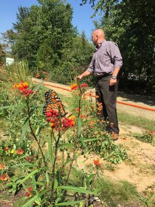 CEO Matt Foster in the Aquatrols Pollinator Garden